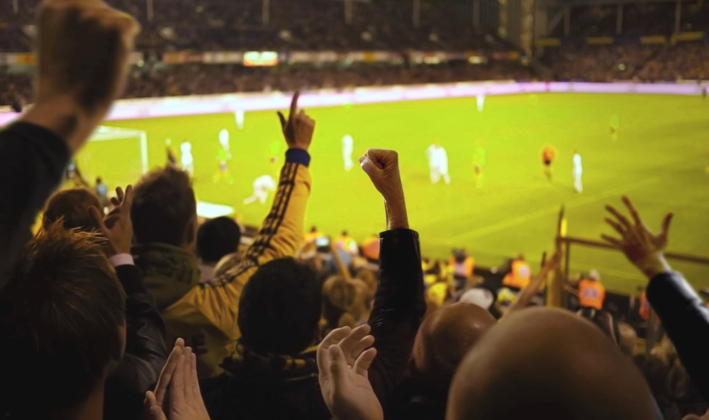 Fotbollsfans på läkaren under en match