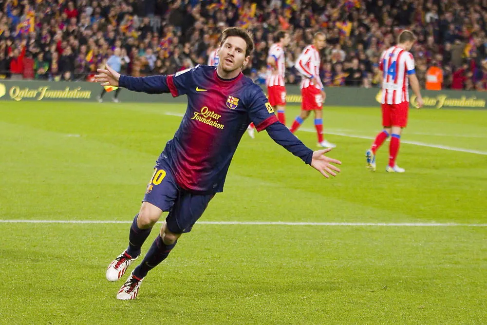 Lionel Messi efter ett av många mål i Barcelona